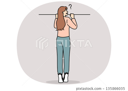 Curious woman peeks out from behind fence, standing on tiptoes to spy on neighbors Curious woman peeks out from behind fence, standing on tiptoes to spy on neighbors 135866035