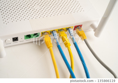 Ethernet cable with wireless router connect to internet service provider network. 135866119