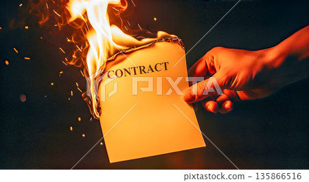 hand holding contract paper document burning in red flame agreement termination cancellation crisis failure concept hand holding contract paper document burning in red flame agreement termination cancellation crisis failure concept 135866516