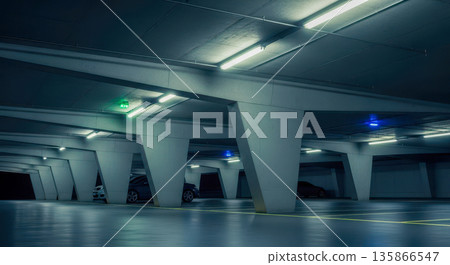 Empty underground parking garage with concrete columns for concept of urban, industrial, or minimalist background Empty underground parking garage with concrete columns for concept of urban, industrial, or minimalist background 135866547