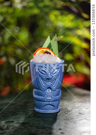 Tiki style cocktail in ceramic mug Tiki style cocktail in ceramic mug 135866658