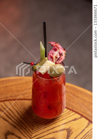 Bloody mary style cocktail with savory garnish Bloody mary style cocktail with savory garnish 135866671
