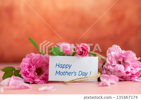 Minimalistic background of roses petals and the inscription thank you Minimalistic background of roses petals and the inscription thank you 135867174