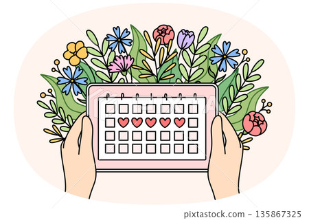 Menstrual cycle calendar in hands of woman and flowers, for tracking of PMS days 135867325