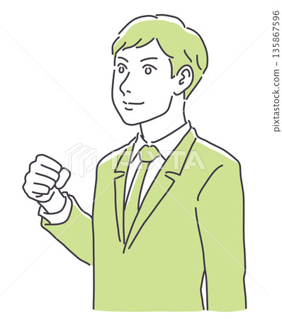 A man in a suit clenching his fist 135867596