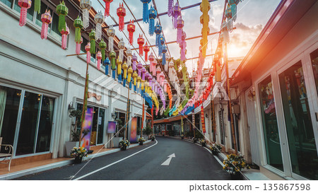 Colorful paper lanterns hanging over asian street alley, vibrant multicolor festival lanterns above narrow old town alleyway, Bangkok Thailand 135867598