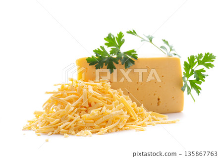 Fresh yellow cheese with grated pieces and green garnish Fresh yellow cheese with grated pieces and green garnish 135867763