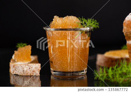 Appetizing roe composition featuring savory texture and natural garnish Appetizing roe composition featuring savory texture and natural garnish 135867772