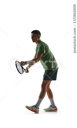Tennis player preparing serve isolated on white background. 135868806