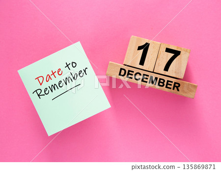 Date December 31 to remember concept with sticky note and wooden calendar Date December 31 to remember concept with sticky note and wooden calendar 135869871