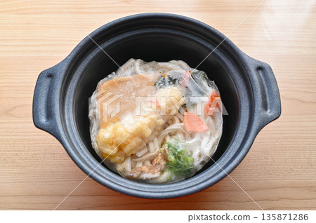 Frozen nabeyaki udon before cooking Frozen nabeyaki udon before cooking 135871286