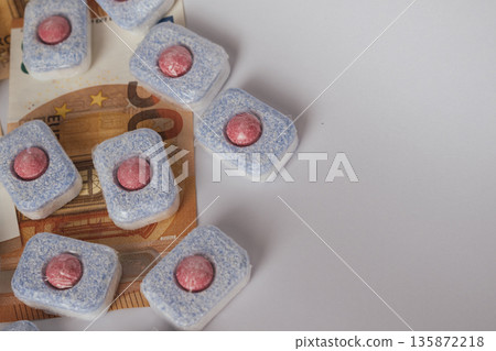 Cleaning supply expense: dishwasher tablets placed directly on euro banknotes Cleaning supply expense: dishwasher tablets placed directly on euro banknotes 135872218