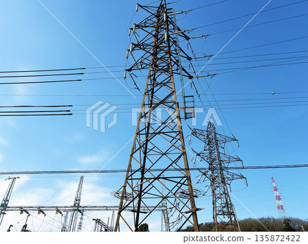 Tower rising in the blue sky 135872422