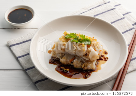 Chinese Steamed Rice Noodle Roll with shrimp and crispy tofu topped with sweet soybean vinaigrette.Thai snack food.(Kuay Thiao Lord) Chinese Steamed Rice Noodle Roll with shrimp and crispy tofu topped with sweet soybean vinaigrette.Thai snack food.(Kuay Thiao Lord) 135872573