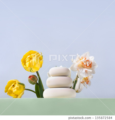 Wood slice podium with spring flowers tulips and daffodils. Concept scene stage showcase for new product, banner, promotion sale, cosmetic, presentation Wood slice podium with spring flowers tulips and daffodils. Concept scene stage showcase for new product, banner, promotion sale, cosmetic, presentation 135872584
