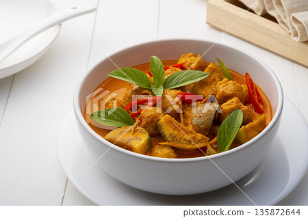 Red curry with clown featherback fishball in white bowl (Gaeng Kua Look Chin pla) Red curry with clown featherback fishball in white bowl (Gaeng Kua Look Chin pla) 135872644