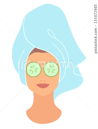 Woman with cucumber on eyes 135872985