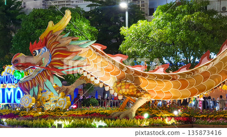 Decoration With Dragon Zodiac At Nguyen Hue Flower Street Festival In Ho Chi Minh City, Vietnam. Decoration With Dragon Zodiac At Nguyen Hue Flower Street Festival In Ho Chi Minh City, Vietnam. 135873416
