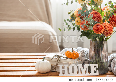 Autumn background with a bouquet of chrysanthemums and pumpkins, copy space. 135873882