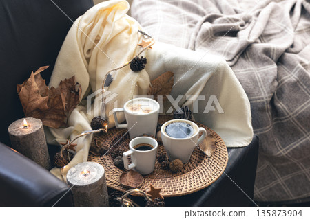 Autumn composition with cups of coffee and leaves. Autumn composition with cups of coffee and leaves. 135873904