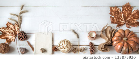 Autumn background with different objects and pumpkin. Flat-lay. 135873920