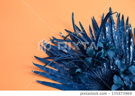 The background is orange, with artificial colors of blue. The background is orange, with artificial colors of blue. 135873969