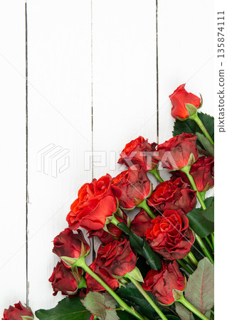Bouquet of red roses on a white background, flat lay, copy space. 135874111