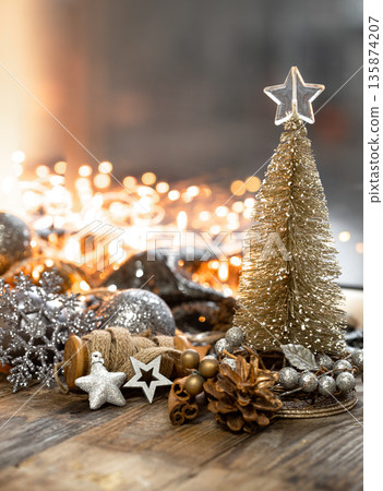 Christmas background with decorative fir tree on blurred background with bokeh. Christmas background with decorative fir tree on blurred background with bokeh. 135874207