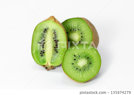 Closeup, kiwi on a white background isolated. 135874279
