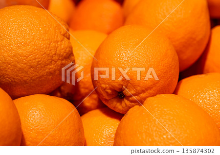 Close-up, oranges in the supermarket on the counter. 135874302