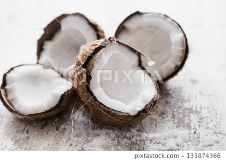 coconut on wooden background coconut on wooden background 135874366