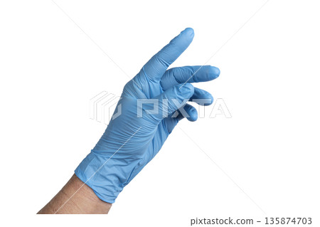 a male hand with a blue glove 135874703