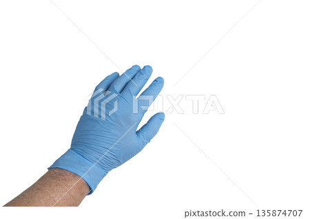 a male hand with a blue glove 135874707