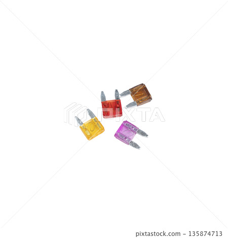 some colored car fuses 135874713