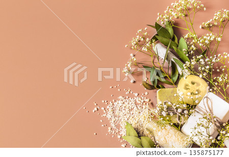 Spa concept with body and face accessories on colored background. Place for text Spa concept with body and face accessories on colored background. Place for text 135875177