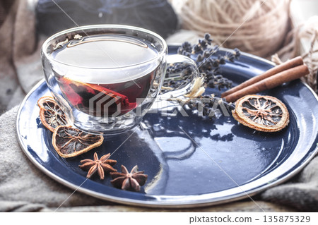 Still life with a cup of tea by the window 135875329