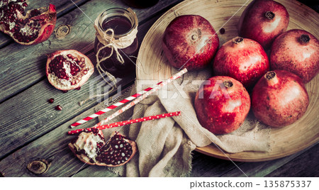 still life with ripe garnets 135875337