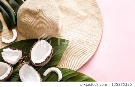 Summer still life with beach hat and coconut 135875350