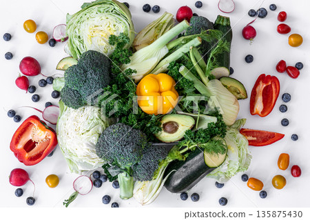 Vegetables and fruits, flat lay isolated on white background. Vegetables and fruits, flat lay isolated on white background. 135875430