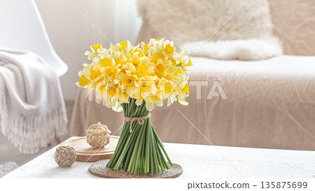 Composition with spring flowers in the interior. Composition with spring flowers in the interior. 135875699