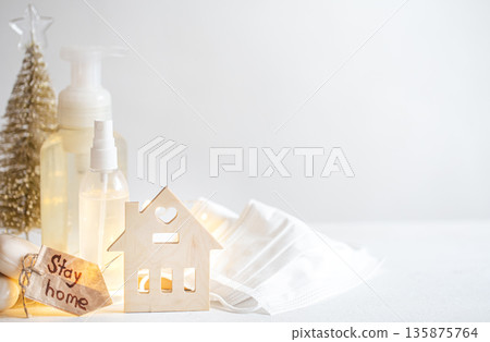 Christmas background with coronavirus personal protective equipment and decor details copy space. Christmas background with coronavirus personal protective equipment and decor details copy space. 135875764