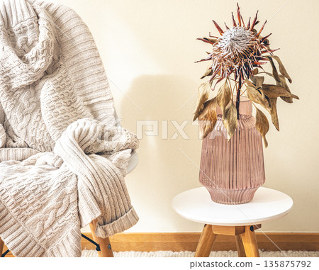 Home composition with protea flower in the interior of the room. Home composition with protea flower in the interior of the room. 135875792