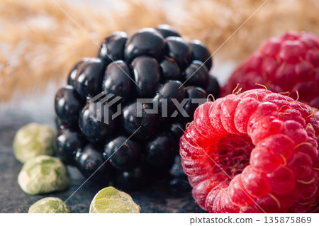 Natural background, blackberry and raspberry, selective focus. 135875869
