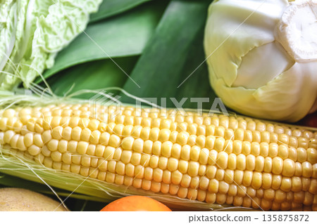 Natural background, fresh corn closeup, macro shot. 135875872