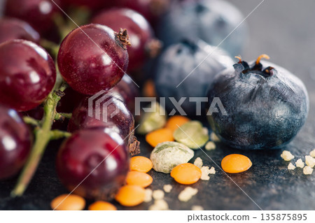 Natural background with different wild berries, macro shot. Natural background with different wild berries, macro shot. 135875895