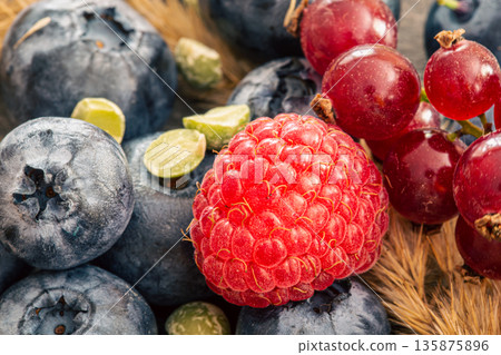 Natural background with different wild berries, macro shot. Natural background with different wild berries, macro shot. 135875896