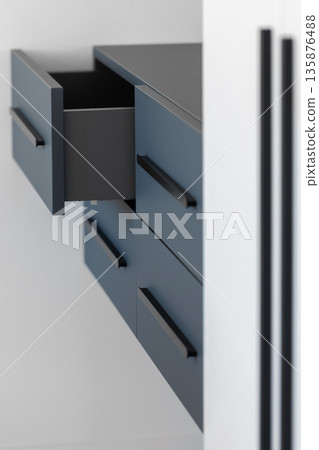 Contrasting planes. Blue matte. Black pulls. Contrasting planes. Blue matte. Black pulls. 135876488