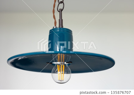 Teal shade sideview. Filament bulb. Industrial style 135876707