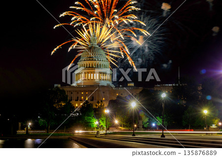 Fireworks burst above Capitol building as people enjoy celebration on Independence day night in Washington D.C. Fireworks burst above Capitol building as people enjoy celebration on Independence day night in Washington D.C. 135876889
