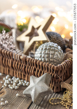 Christmas decorations in a basket. Composition with Christmas decorations. Christmas decorations in a basket. Composition with Christmas decorations. 135877053